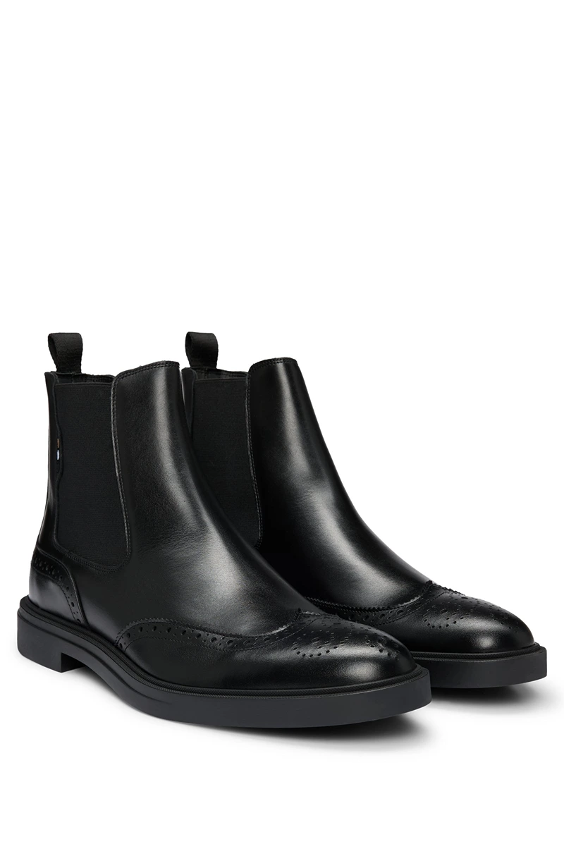 Botines Chelsea de piel calados en color negro para hombre marca BOSS