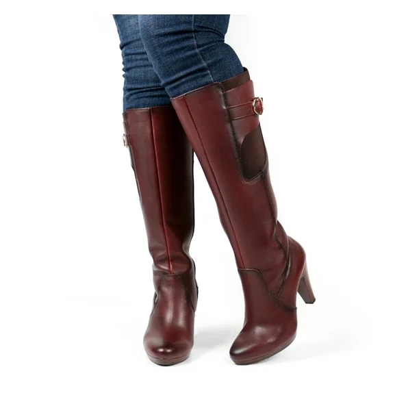 Outfit pantalón ajustado con botas cafés marca Flexi